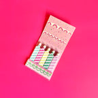 Inside of happy birthday matchbook showing birthday candles as the matchsticks