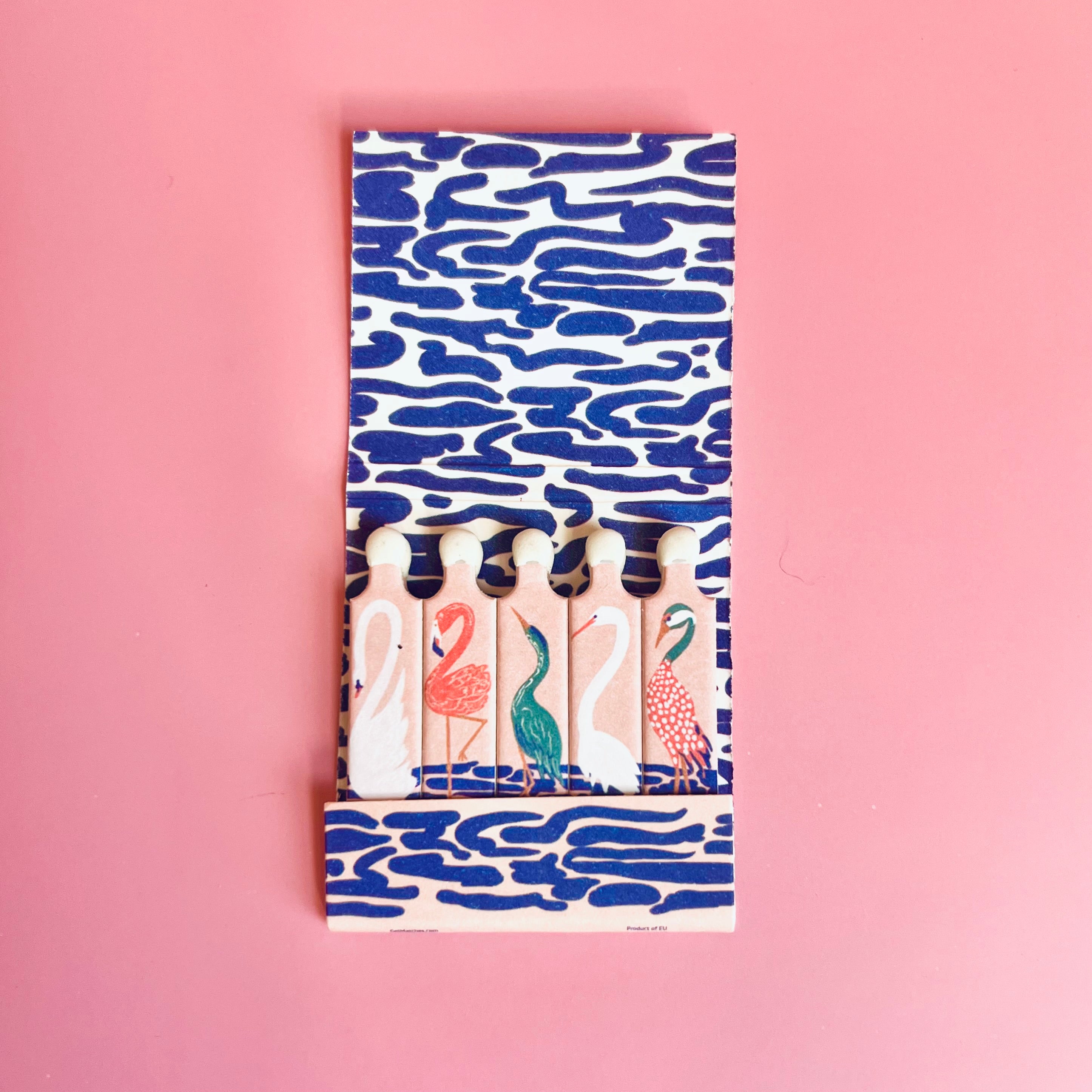 Inside of exotic birds matchbook featuring five different birds depicted on each matchstick