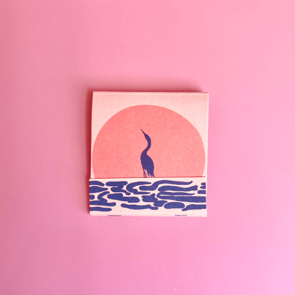 Front of the Exotic Birds matchbook  featuring a blue heron
